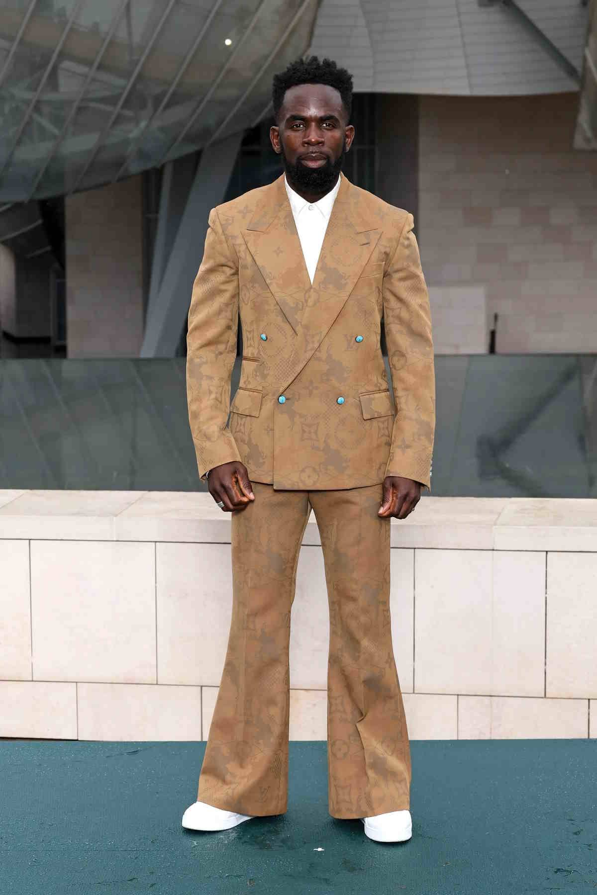 Jimmy Akingbola w stylizacji Louis Vuitton