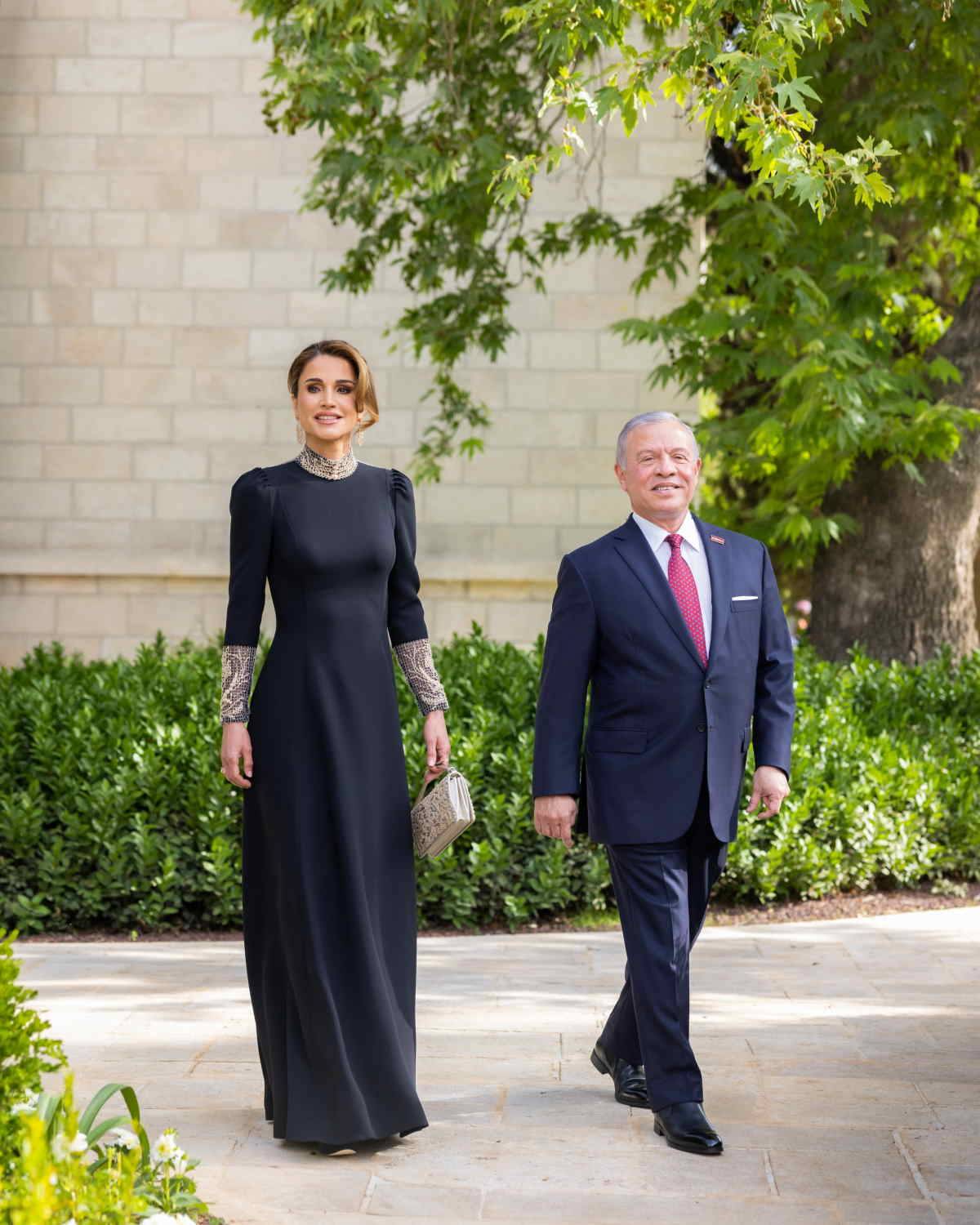 Królowa Jordanii Rania podczas ceremonii ślubnej księcia Husseina i księżnej Rajwy al-Saif. Królowa Rania z Jordanii zostanie babcią. Matka księcia koronnego Husajna z niecierpliwością czeka na narodziny dziecka.